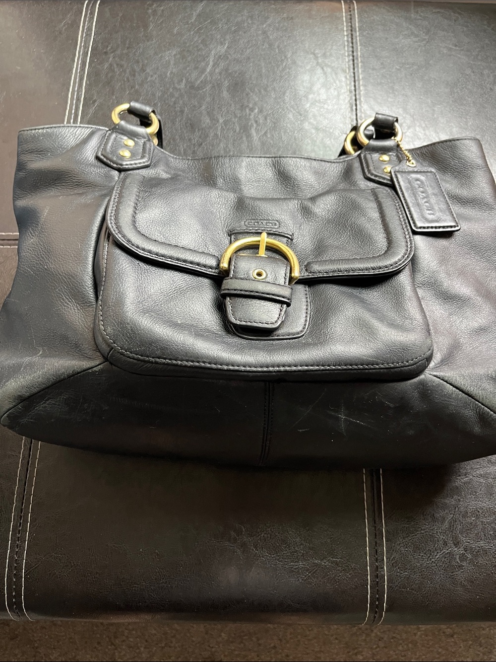 Coach Black Leather Shoulder Bag with Gold Buckle Accents